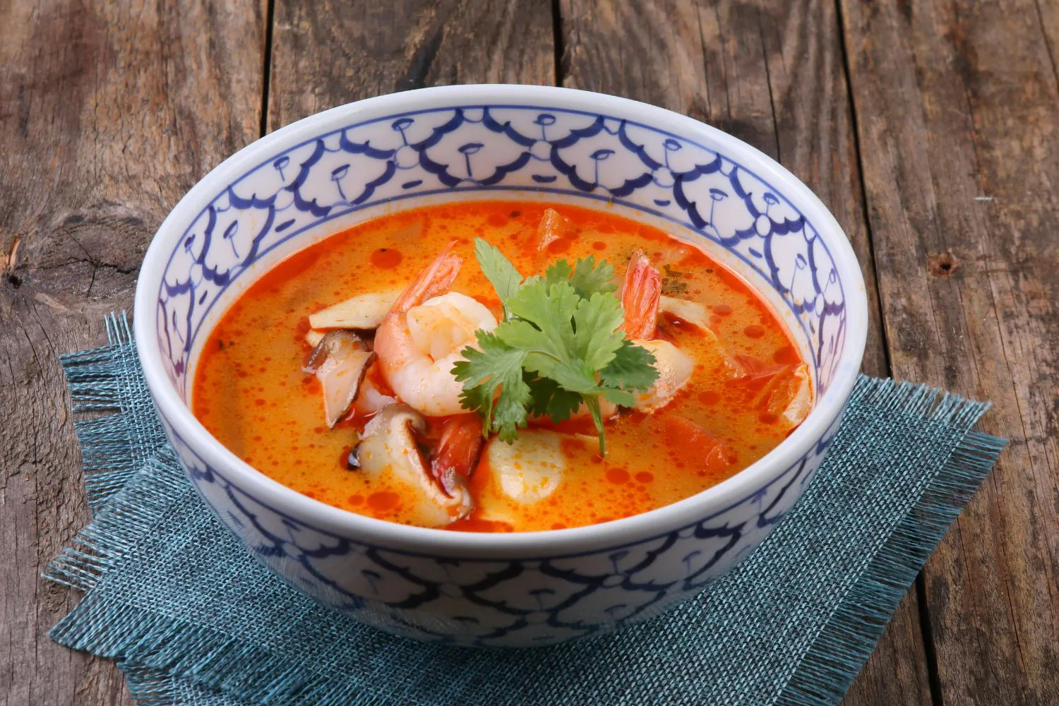 Thai tom yum shrimp soup in patterned bowl at Sam Bistro Thai Restaurant in Middletown